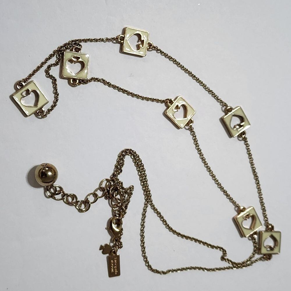 KATE SPADE hole punch Ace necklace white and gold tone‎